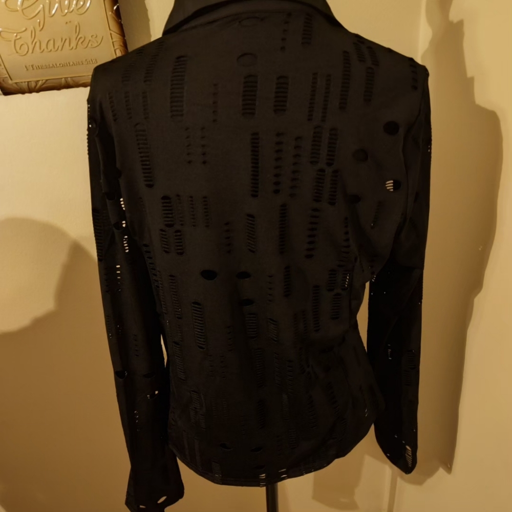 Ladies black blouse with rips